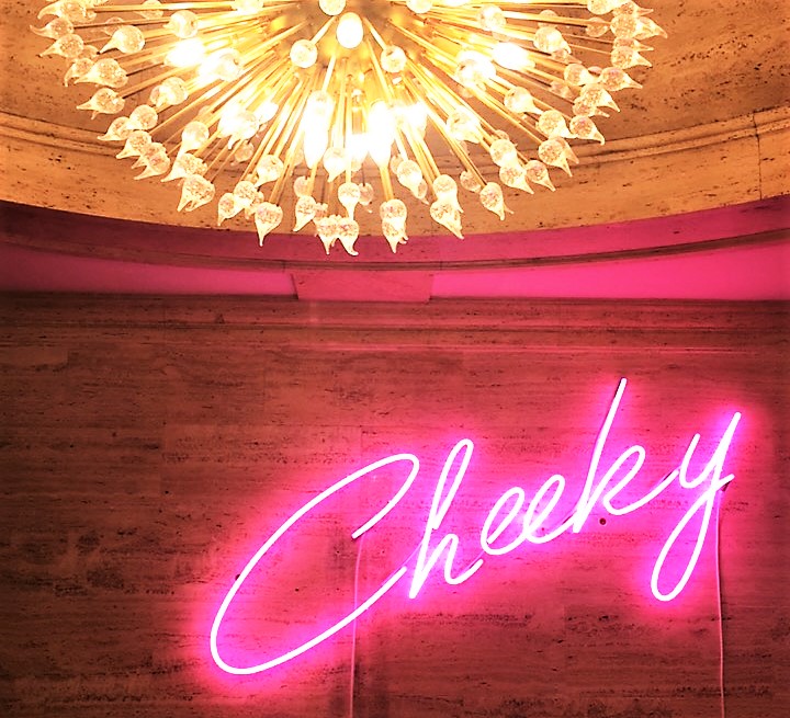 The Ned's 'Cheeky' bar is an express mani-pedi service for the busy professional. Set amongst traditional architectural features and steeped in history, the neon signage adds a fun twist.