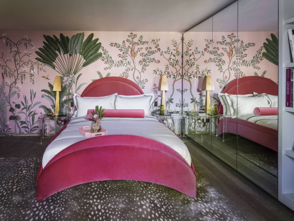Holiday House London - The lovely Amelia Carter of Amelia Carter Interiors had created an luxe and exotic bedroom on the top floor. Cleverly using mirrored wardrobe doors along one wall to add light and depth to the space, and a gorgeous tropical foliage wallpaper by masters De Gournay framing the curved upholstered headboard, this felt both an indulgent and relaxing environment. 