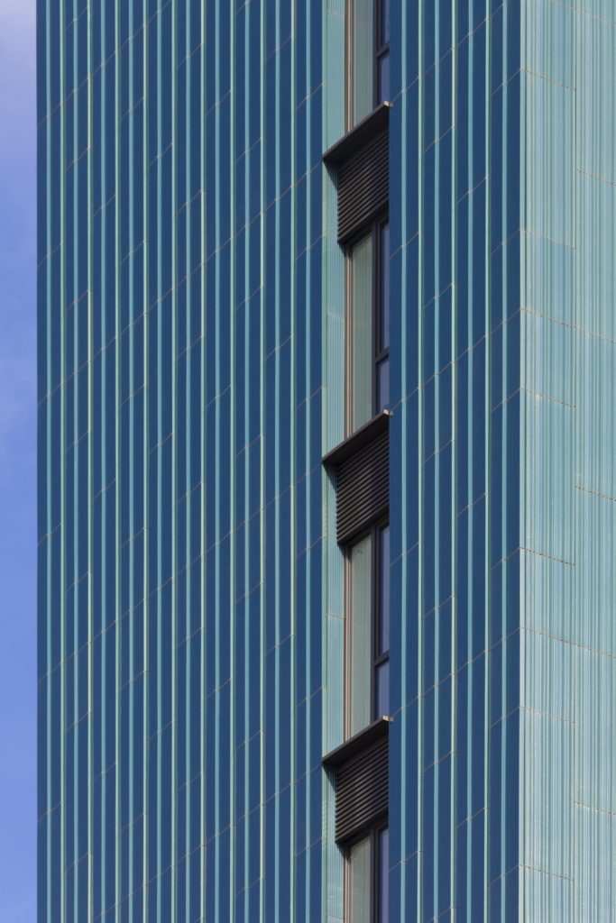 A distinct feature of Mapleton Crescent is the colour of its facade. Beautifully finished with undulating green-blue ceramic tiles, the building's elevations are celebrated with real panache. For me, the tiles are the defining feature of the project and I enjoyed examining the prototypes on display.